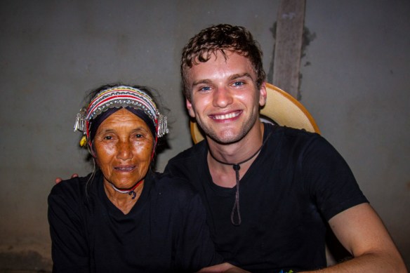 I sat down with a village elder (in traditional Akha dress) for a good ten minutes as Fame interpreted her Akha for me. While sitting with we held each others hands while she explained that she was very ill and had just gotten out of the hospital. This didn't seem to stop her beaming smile and the good laughs we had in our brief meeting. 