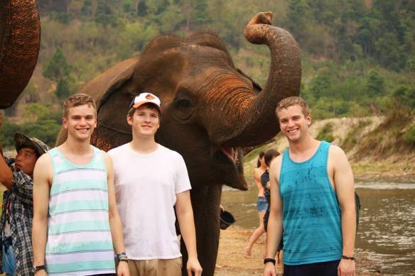 Darryl, Scott, and I hanging out with some elephants in Thailand.